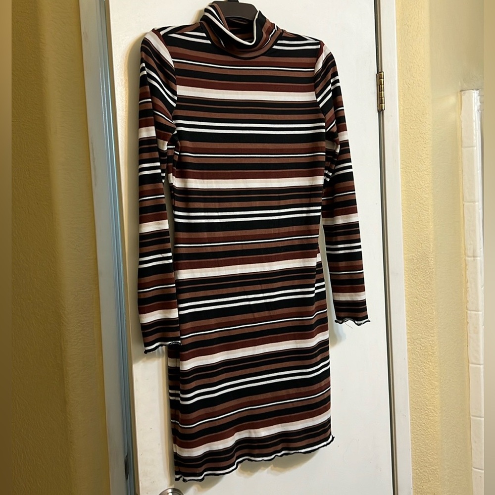 Gently used turtleneck sweater dress. Size M.